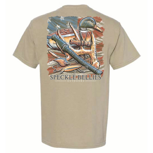 Designed for outdoor enthusiasts, the Speckle Bellies Outdoor Tools Pocket Tee combines comfort and functionality. Crafted from 100% cotton, this short sleeve tee features a front pocket and a detailed back graphic showcasing essential gear including a grunt call, duck call, duck decoy, rattling antlers, and fishing lures. It’s an ideal choice for those who appreciate authentic outdoor equipment and want a durable, breathable shirt for their adventures.