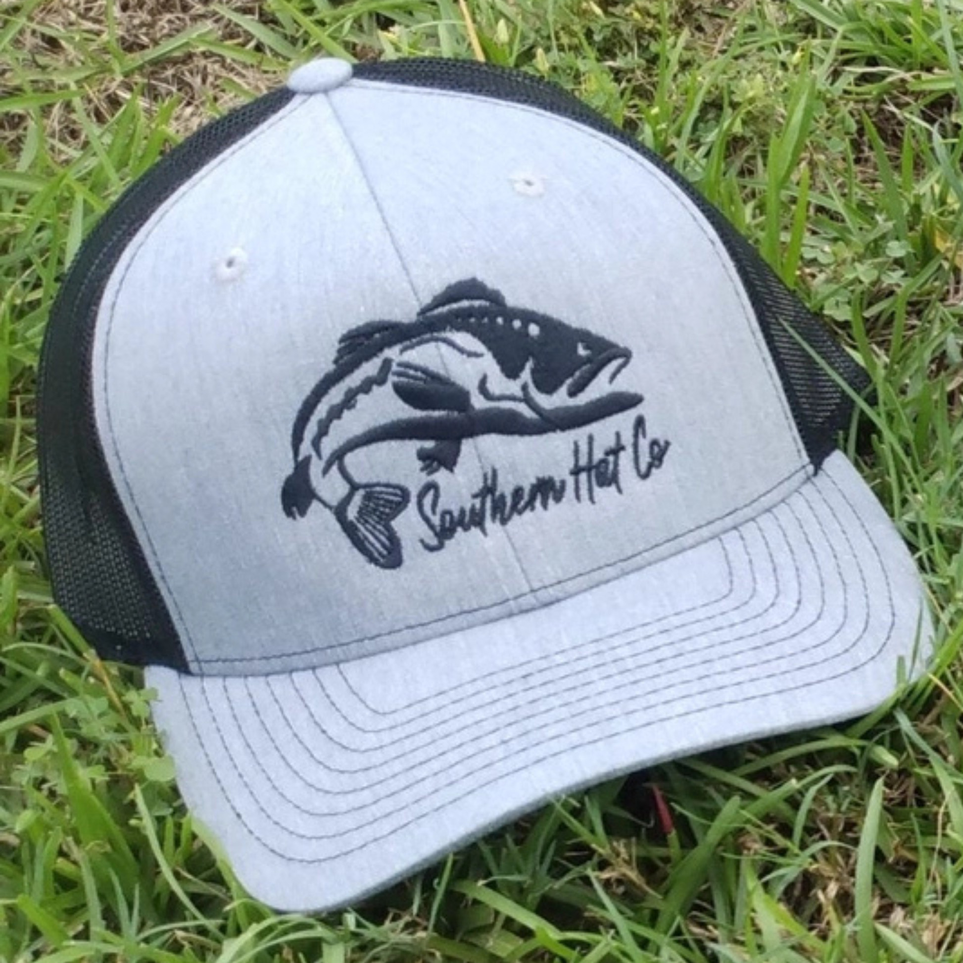 The Southern Hat Co Apparel Solo Bass Richardson 112 Hat is designed for anglers and outdoor enthusiasts who value both style and function. Featuring a bold solo bass graphic, this hat offers a classic look combined with the durability and comfort of the Richardson 112 model. It includes structured front panels and a breathable mesh back for ventilation, while the adjustable snapback closure ensures a secure, customizable fit. Whether you're casting lines or enjoying time outdoors, this hat provides reliabl