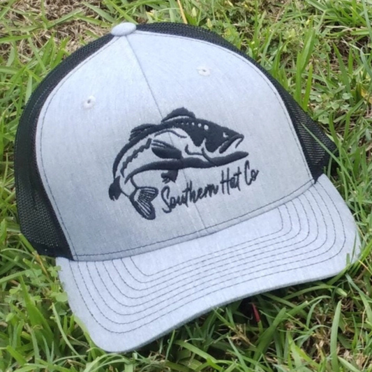 The Southern Hat Co Apparel Solo Bass Richardson 112 Hat is designed for anglers and outdoor enthusiasts who value both style and function. Featuring a bold solo bass graphic, this hat offers a classic look combined with the durability and comfort of the Richardson 112 model. It includes structured front panels and a breathable mesh back for ventilation, while the adjustable snapback closure ensures a secure, customizable fit. Whether you're casting lines or enjoying time outdoors, this hat provides reliabl
