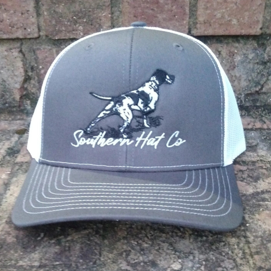 Make a bold statement with the Southern Hat Co Apparel Pointer Dog Design Richardson 112 Hat. Featuring a striking embroidered pointer dog design, this hat is definitely on point (pun intended), adding a touch of personality and charm to any outfit. Crafted with the superior quality of Richardson hats, the 112 model offers both durability and comfort.&nbsp;

- Key Features: * Striking embroidered pointer dog design for a statement-making look * Premium Richardson 112 construction for lasting durability and 