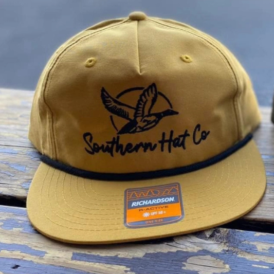 Embrace classic style with the Retro Rope Style Richardson 256 Hat from Southern Hat Co. Crafted with a solid front and no mesh, this snapback offers a clean, timeless look. Its sturdy build provides lasting comfort and durability, making it an ideal choice for those who appreciate vintage-inspired headwear with modern reliability.