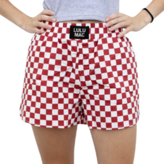 Lulu Mac Crimson/White Checkered Shorts offer a stylish and comfortable fit perfect for game day or casual outings. Designed with women's wear in mind, these checkered pocket shorts combine vibrant crimson and crisp white for a bold look. Crafted to ensure ease and flexibility, they provide both practicality and flair for your seasonal wardrobe.