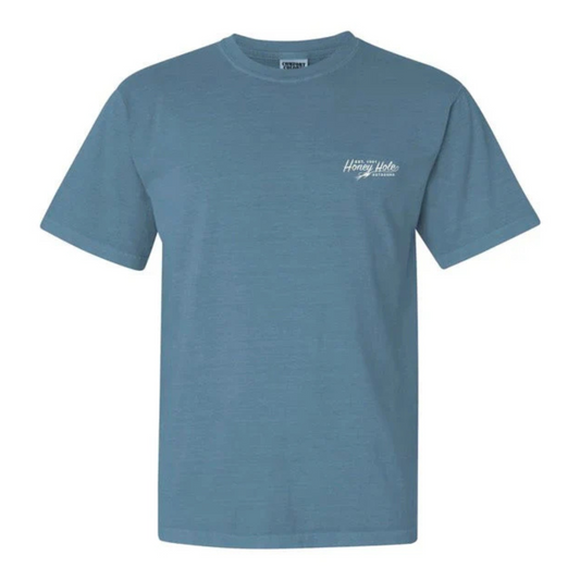 The Honey Hole Outdoors Fly Flag Short Sleeve Tee combines patriotic style with a passion for fishing. Crafted from 100% cotton, it ensures comfort and breathability during outdoor activities. The design features the American flag alongside the Honey Hole Outdoors logo, highlighted by a fishing fly integrated into the script, reflecting your love for angling. Durable and stylish, this tee is ideal for those who value both heritage and their outdoor pursuits.