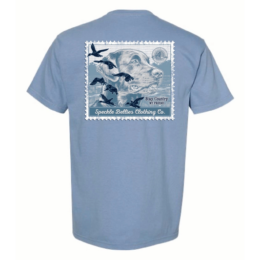 Crafted from 100% cotton, the Speckle Bellies-Lab Duck Stamp Short Sleeve Pocket Tee combines comfort with distinctive style. This expertly designed shirt showcases a classic lab and duck stamp graphic on the back, making it an ideal choice for outdoor enthusiasts and collectors. The convenient front pocket adds both function and a casual touch, ensuring this tee performs well in both everyday and active settings. Denim Blue Only